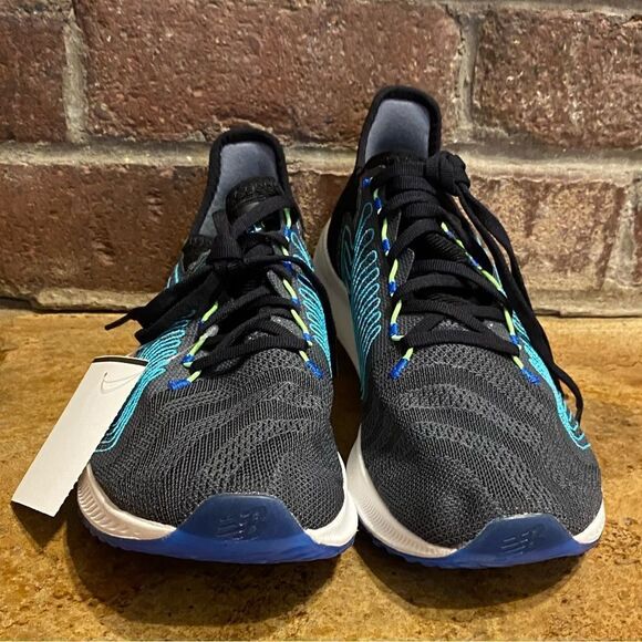 NEW Balance FuelCell Rebel Running Shoe in black and‎ blue
